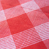 close up of cheerful red check dog bandana